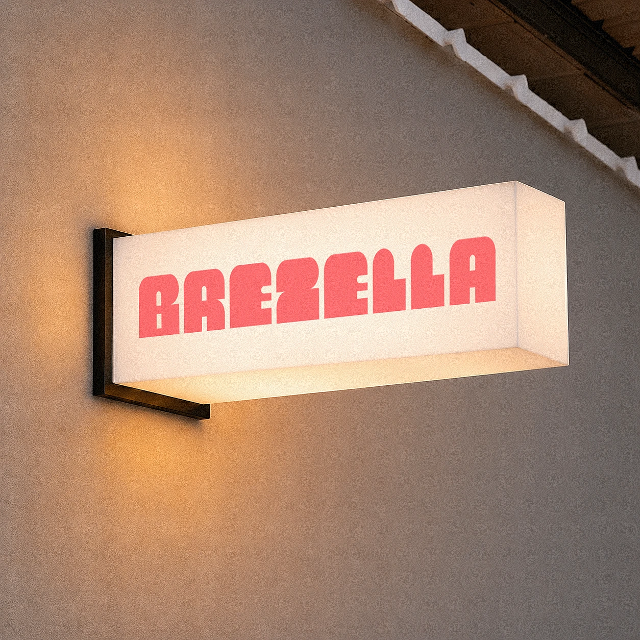 Leuchtendes Brezella Schild an einer Fassade bei warmem Abendlicht.